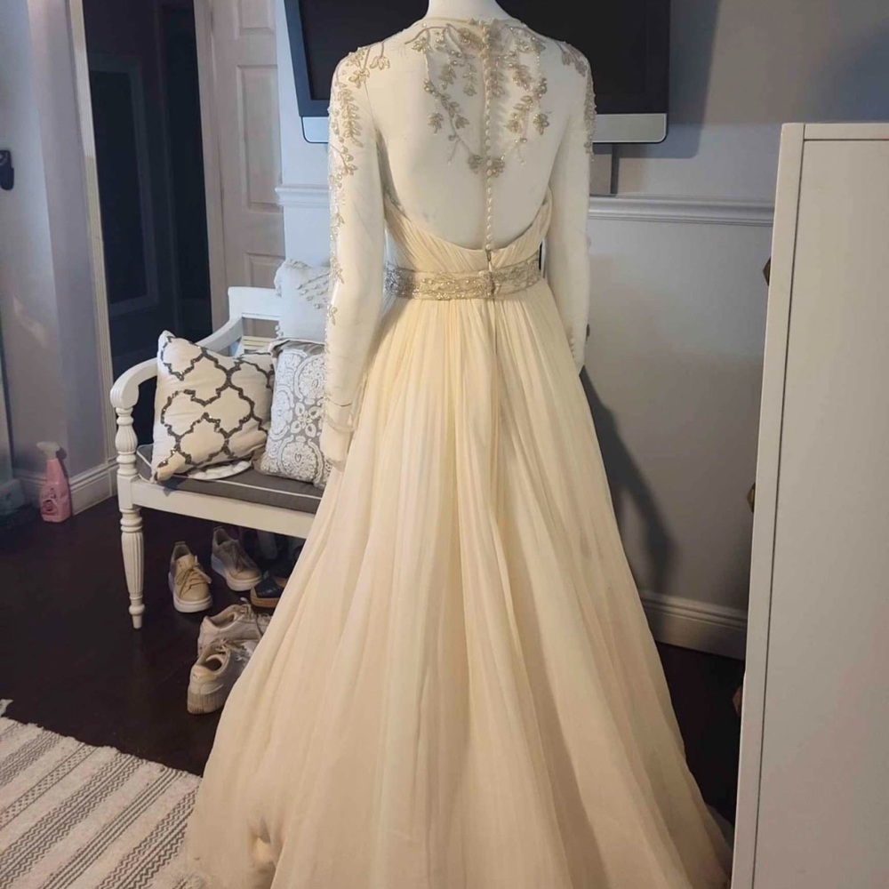 Elegant Cream Gown with Gold Embroidery